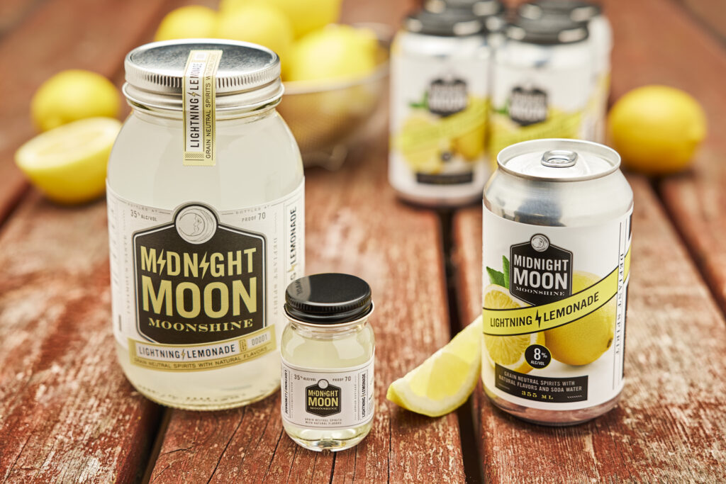Midnight Moon Moonshine Lightning Lemonade in a 750ml & 50ml jar, and the new 8% ALC/VOL Canned Cocktail.